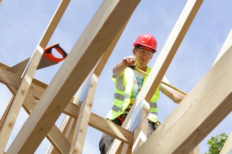 Contractor working on a roof structure