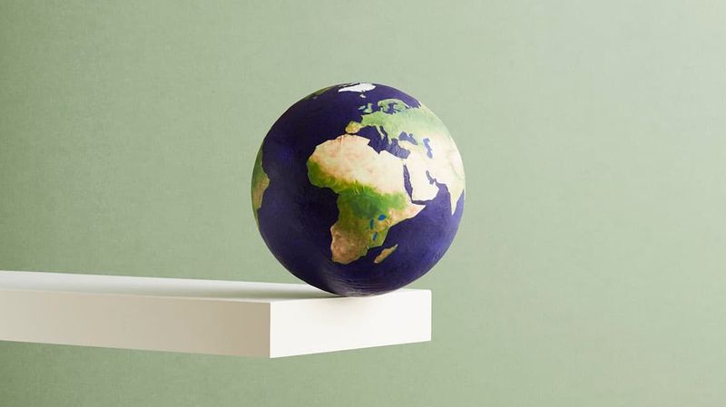 Earth hanging in the balance
